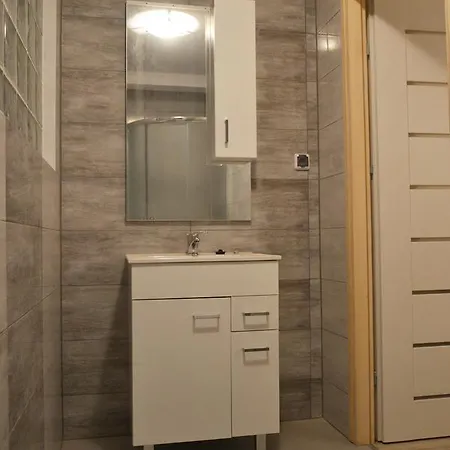 Quarto em Acomodações Particulares Goscinne Bartek *